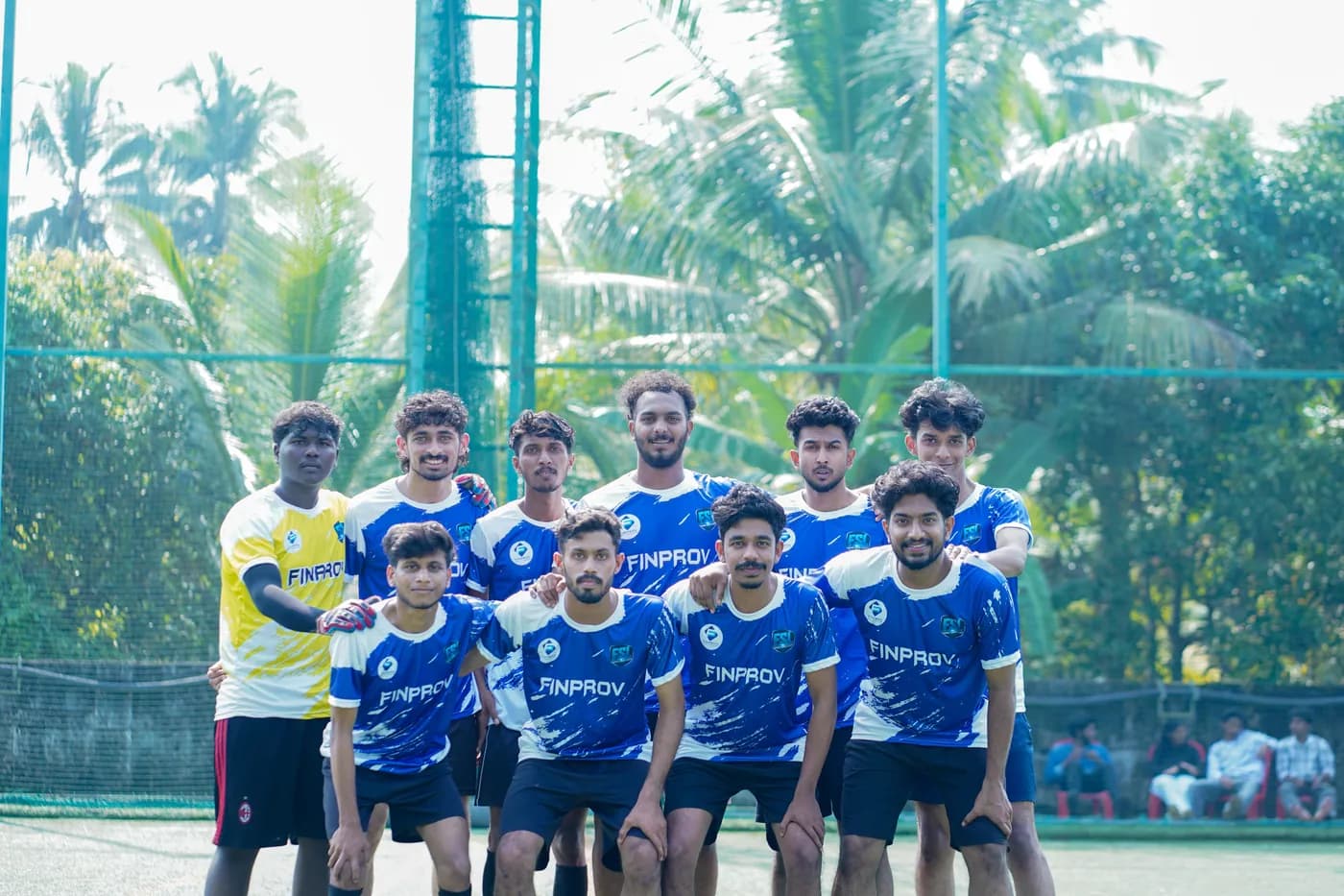 Finprov football team posing together on the field