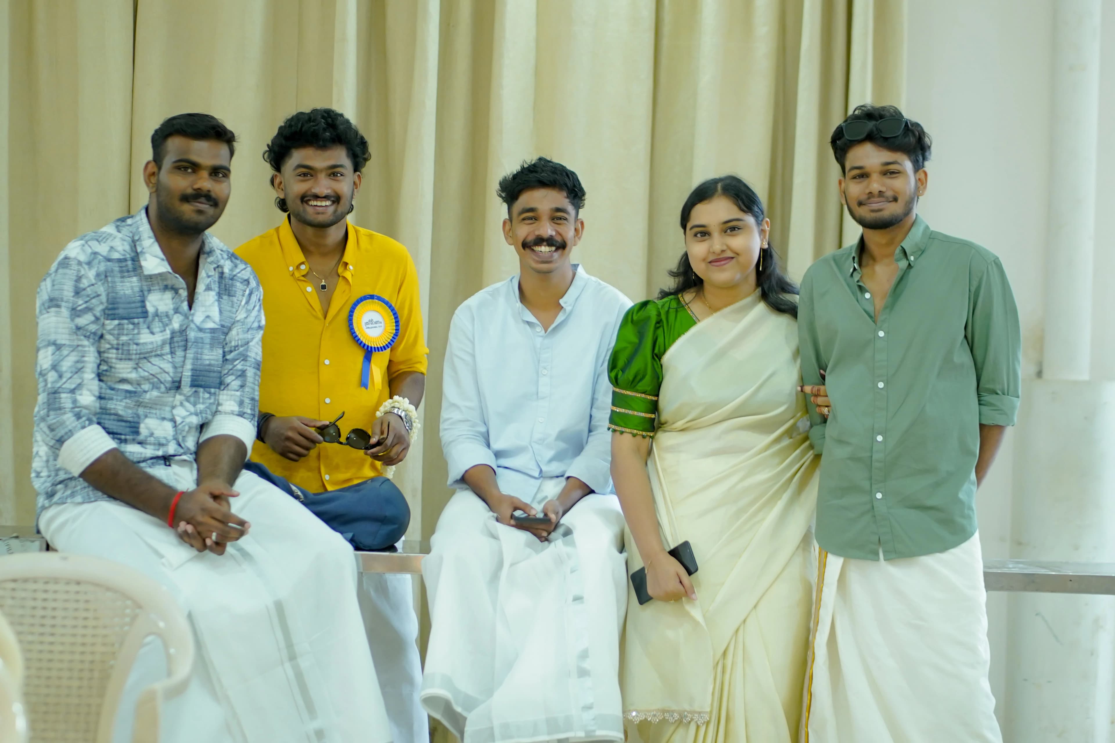 Finprov learners in traditional dress for Onam
