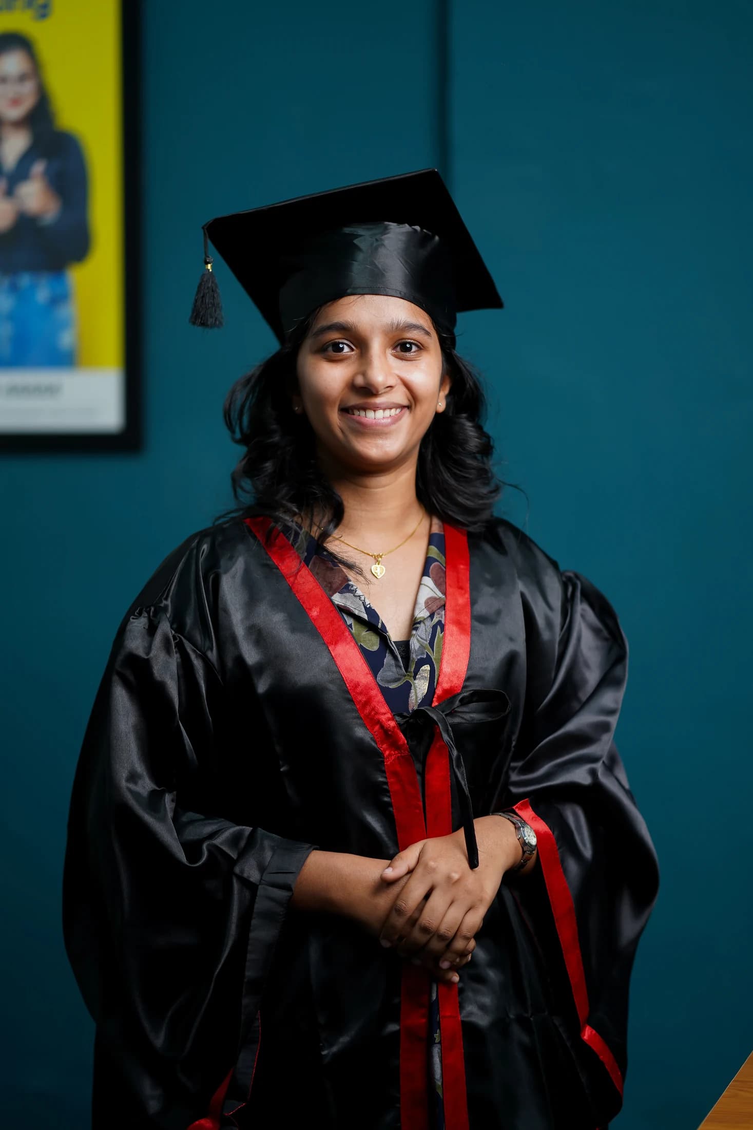 A Finprov graduate in her convocation gown